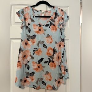 NWOT See in love floral blouse with ruffle sleeves.  Size Large.